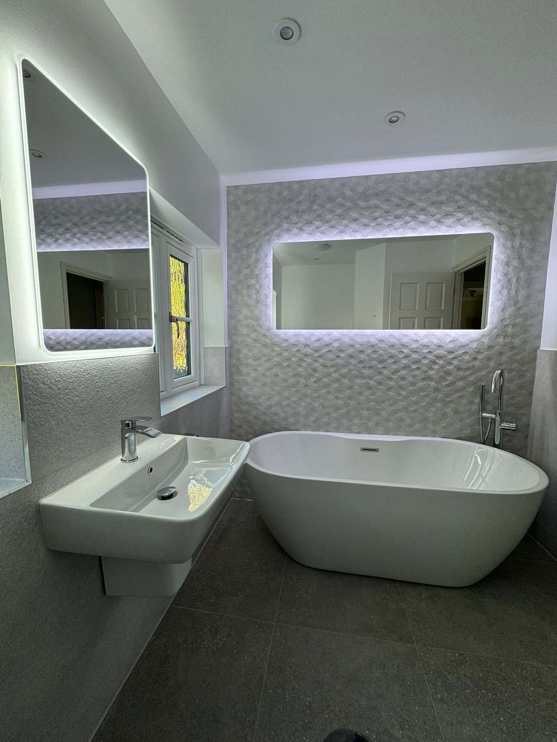Freestanding bath in a luxury bathroom renovation by MPS